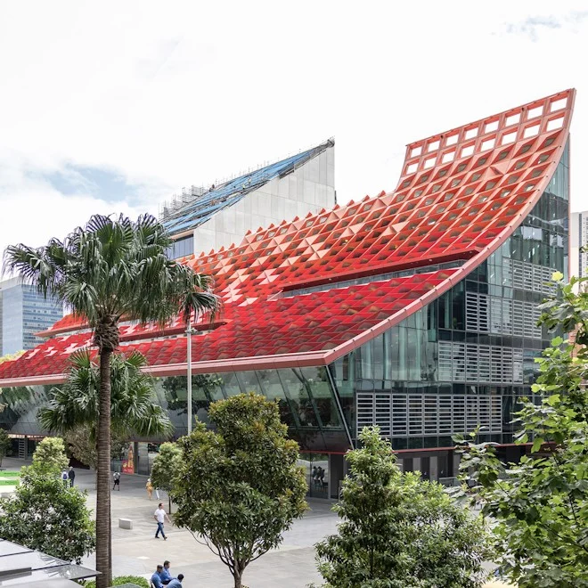 Outside view of PHIVE - 5 Parramatta Square. with red and orange curved geometric roof