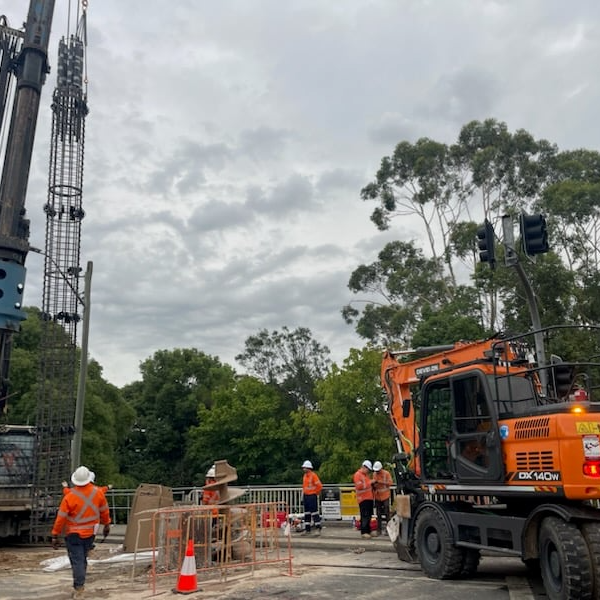 Construction equipment and workers on Hunts Creek Bridge
