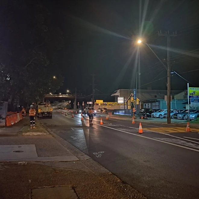 Night shot of workers on Hunts Creek Bridge